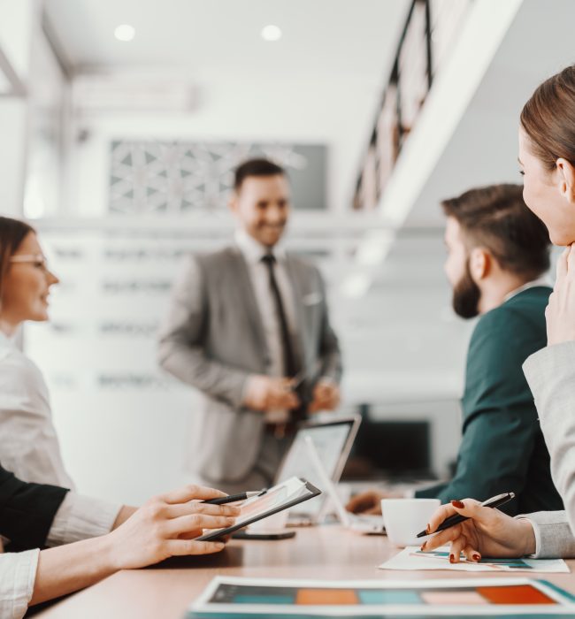 Handsome,Caucasian,Employee,Standing,In,Boardroom,And,Talking,About,New Handsome,Caucasian,Employee,Standing,In,Boardroom,And,Talking,About,New